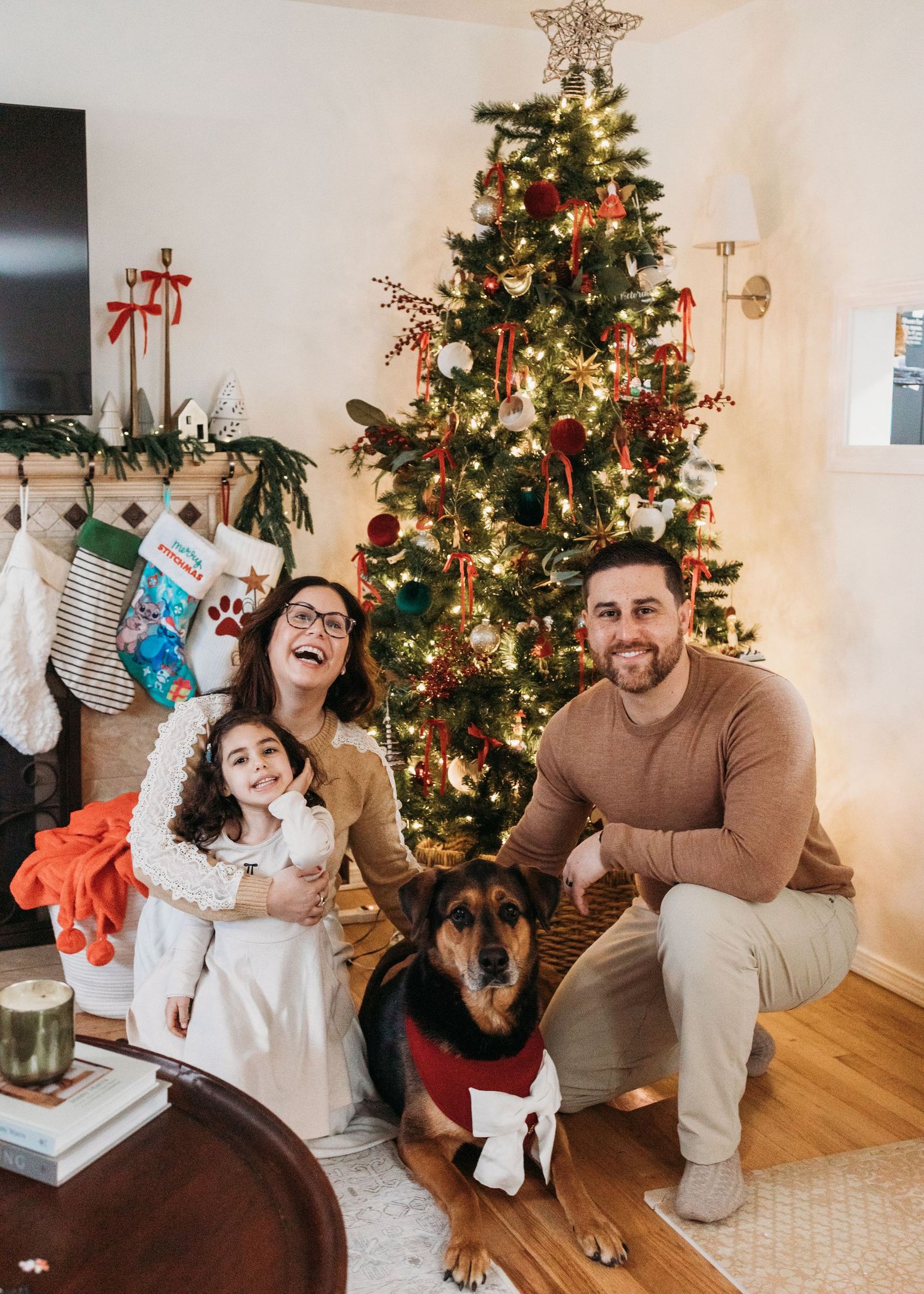 Four connected images show a family playfully laughing and interacting on a front porch of a green house.