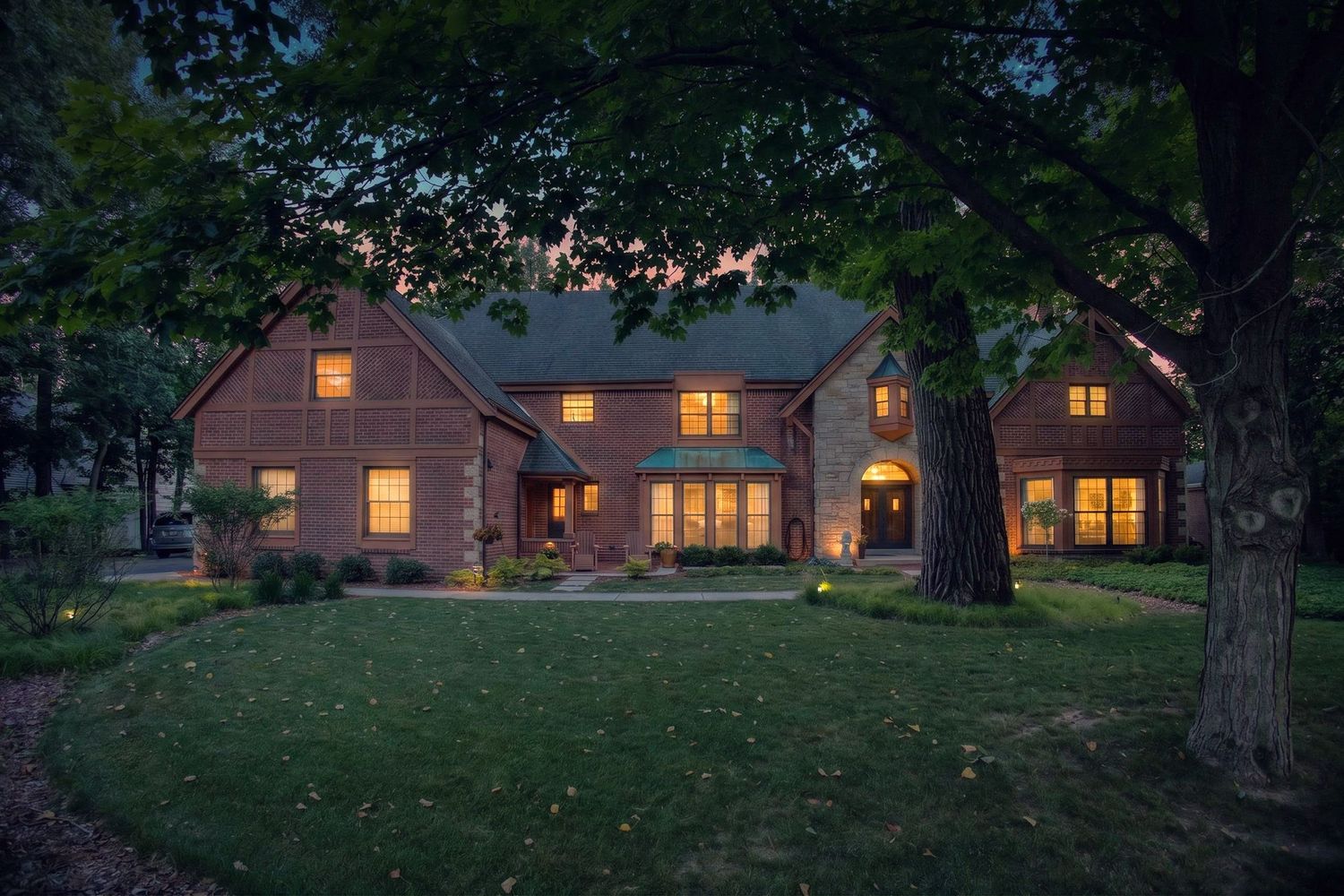 Twilight exterior photo of a two-story home