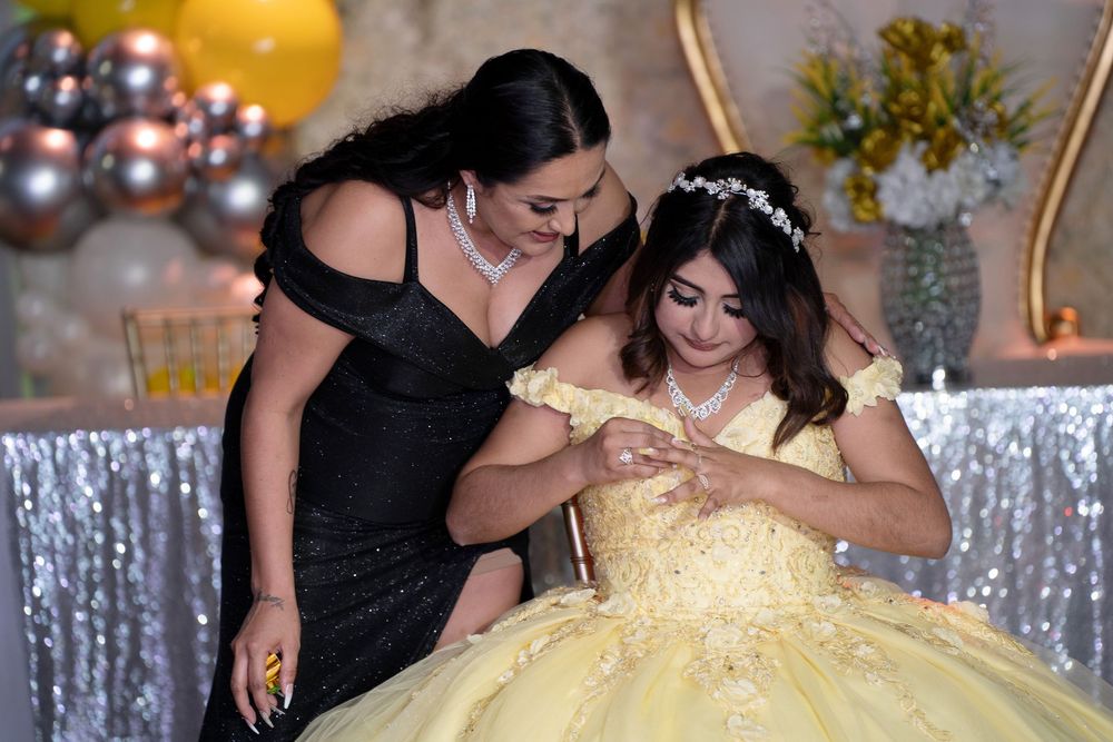 Beautiful Quinceañera centerpiece and reception decorations photographed during Briana's Dream Quinceañera in Dallas Fort Worth Texas.