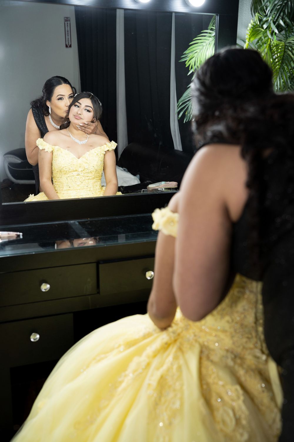 Luxury Quinceañera reception décor featuring yellow roses butterflies and elegant details photographed in Dallas Fort Worth Texas.