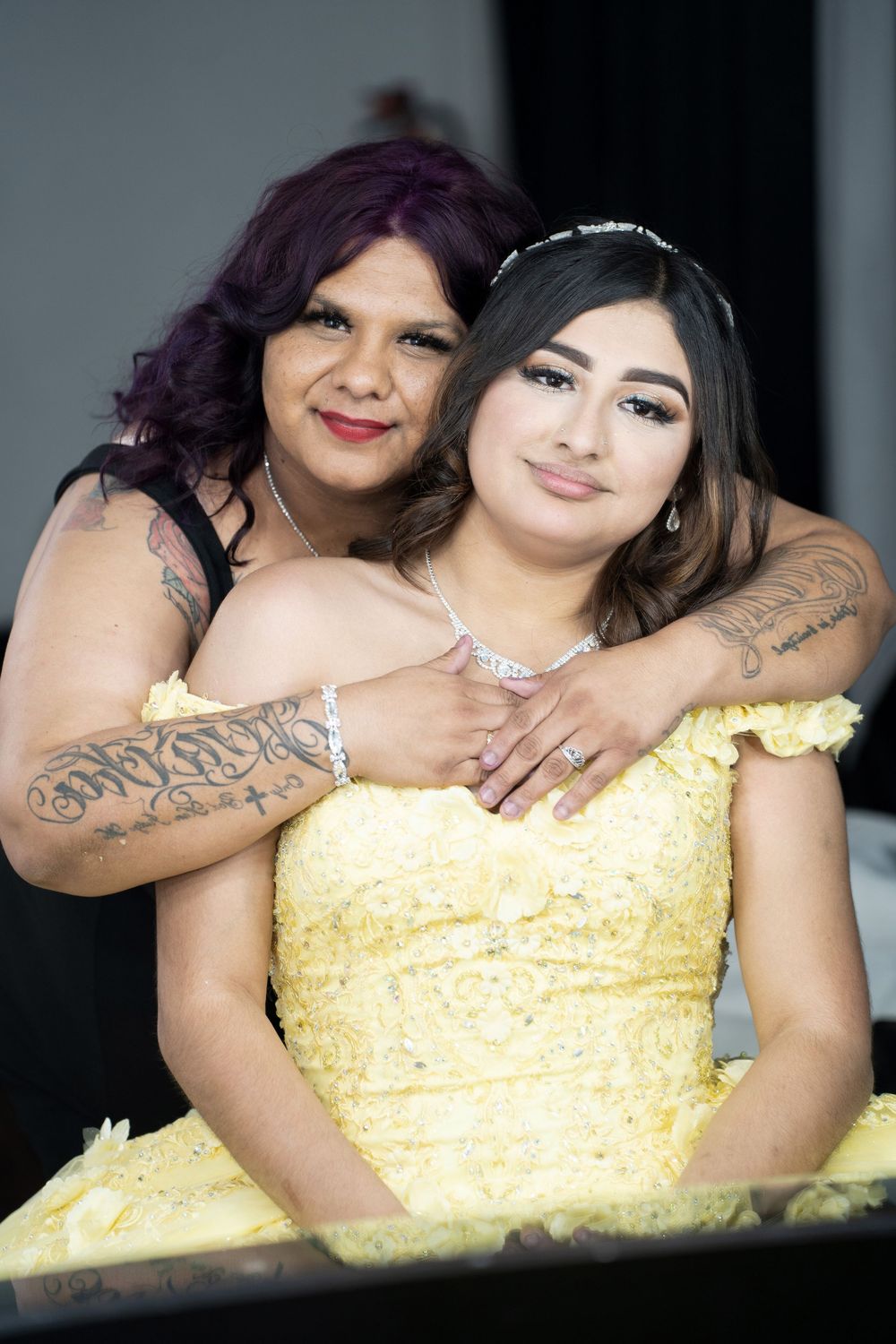 Yellow floral Quinceañera cake celebrating Briana's Dream Quinceañera photographed by Dallas Fort Worth Quinceañera photographer.