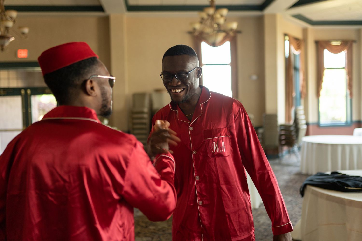 Nigerian groom red traditional attire Igbo wedding ceremony Orlando Florida