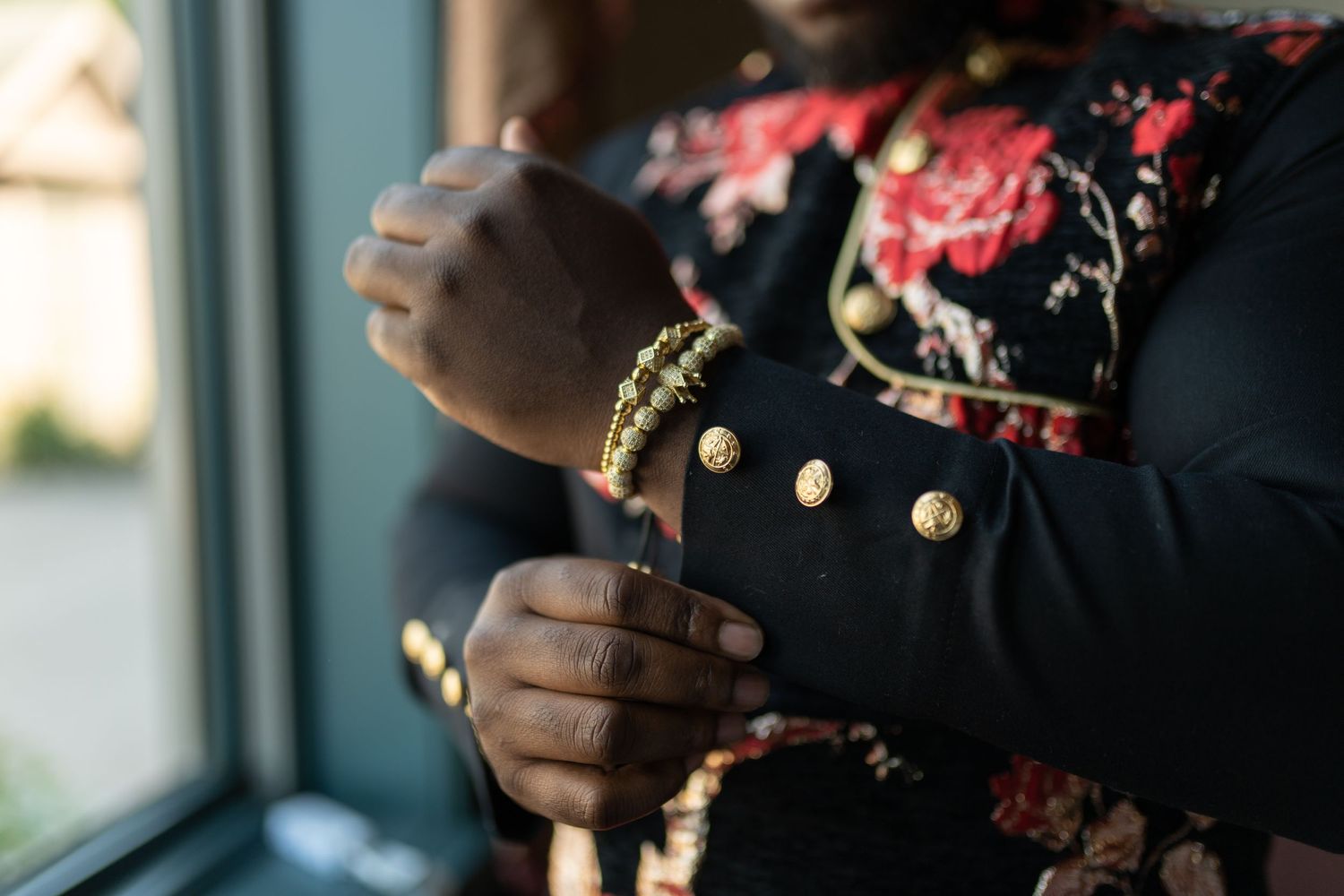 Nigerian groom traditional embroidered attire detail portrait Orlando Florida