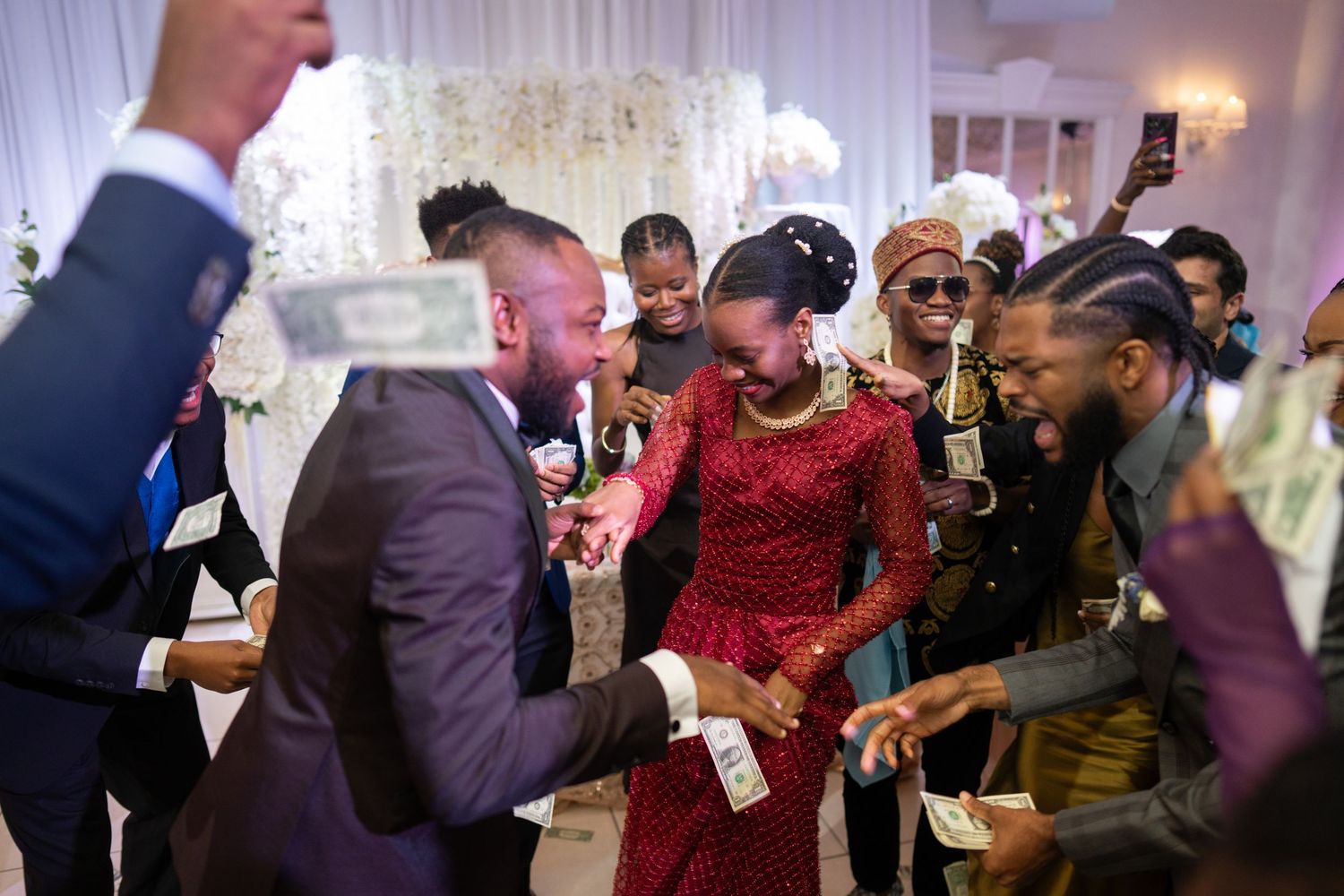 Nigerian wedding money spray reception candid photography Central Florida