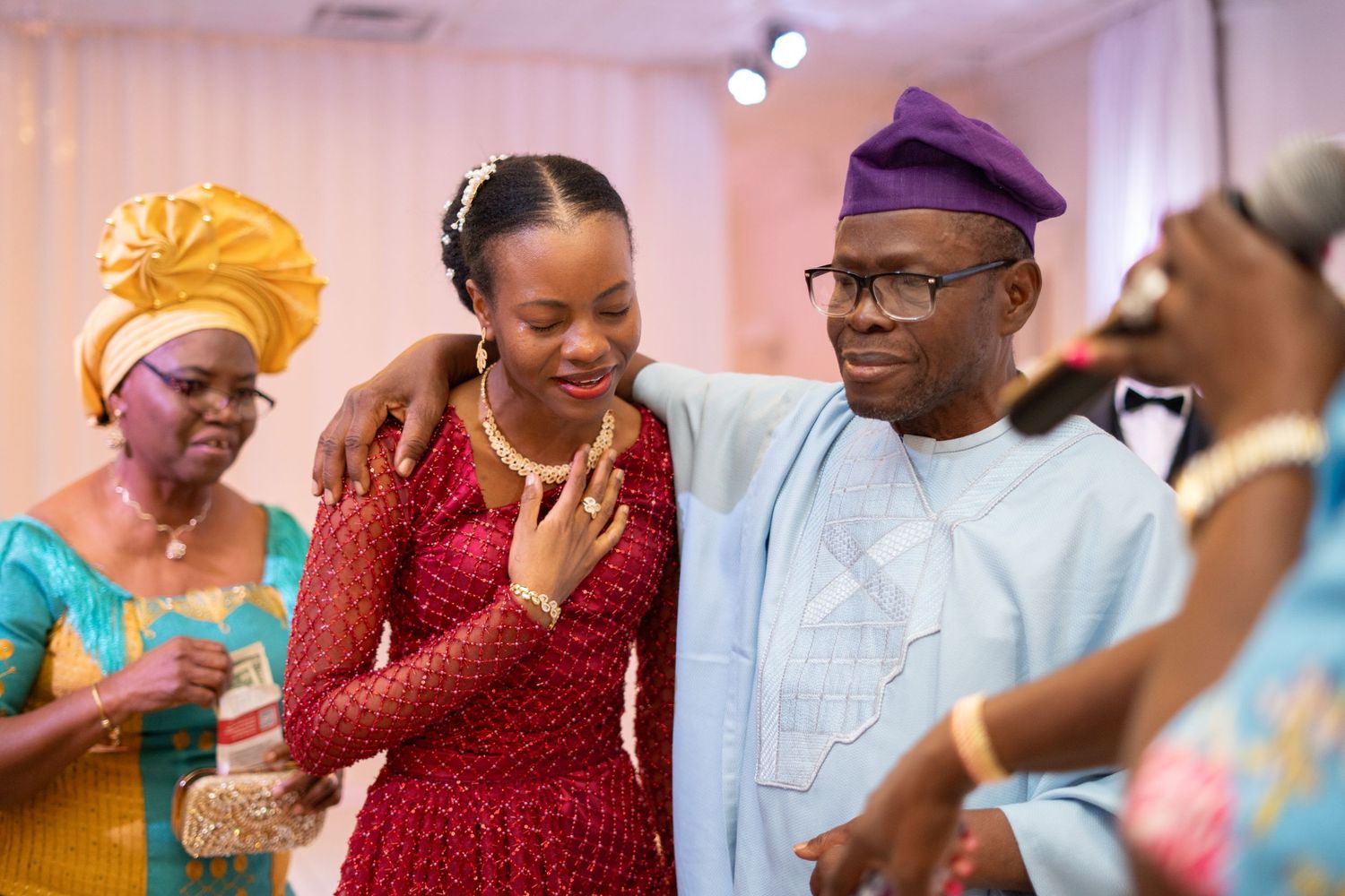Yoruba wedding family candid moment gele headwrap photography Orlando Florida