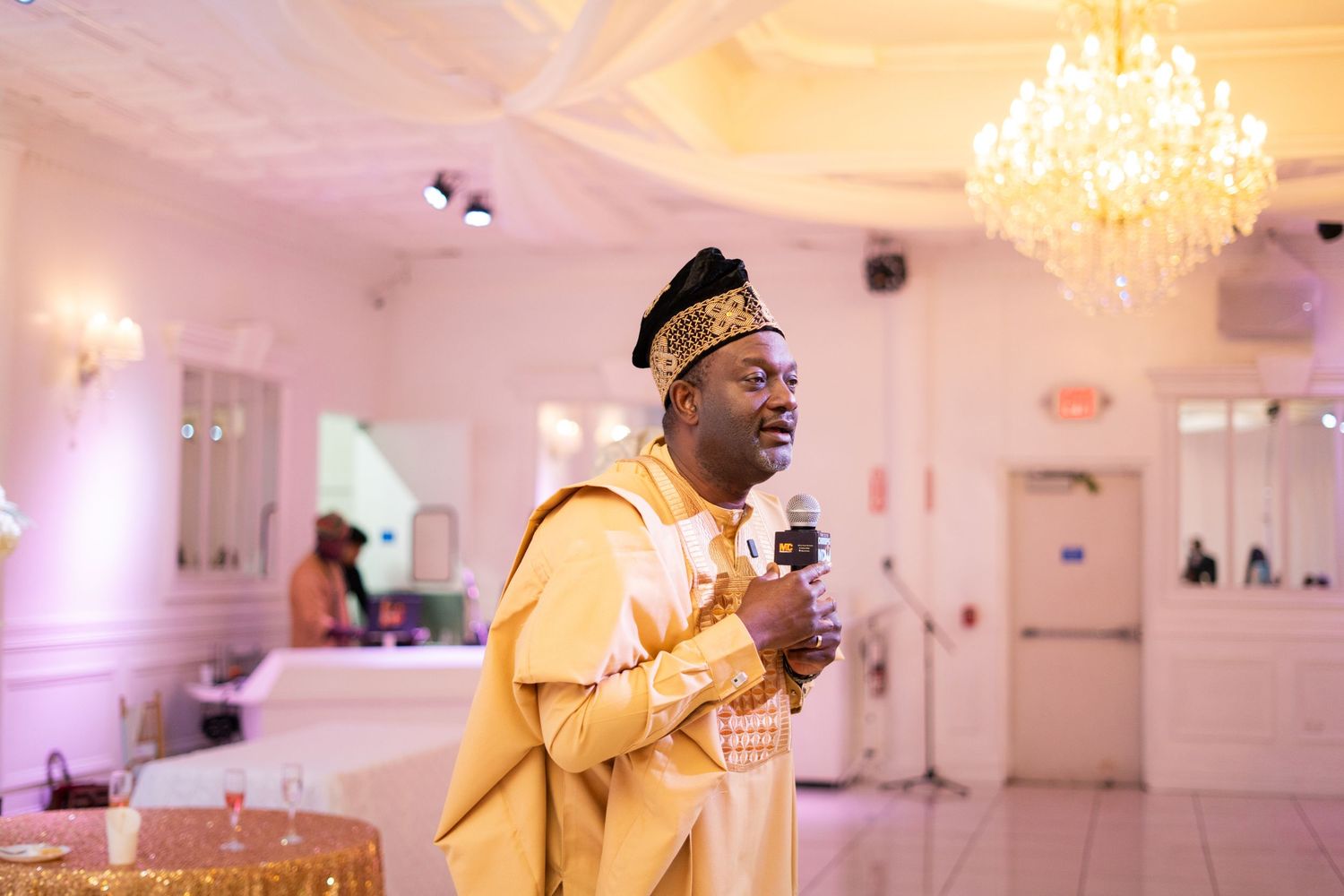 Nigerian groom traditional attire agbada speech reception Orlando Florida