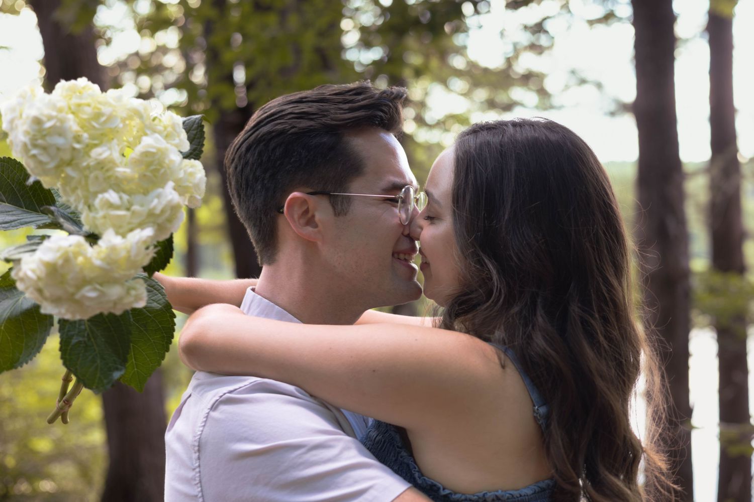 Golden Hour Couples Session at Walnut Creek Park with woods in the background.
