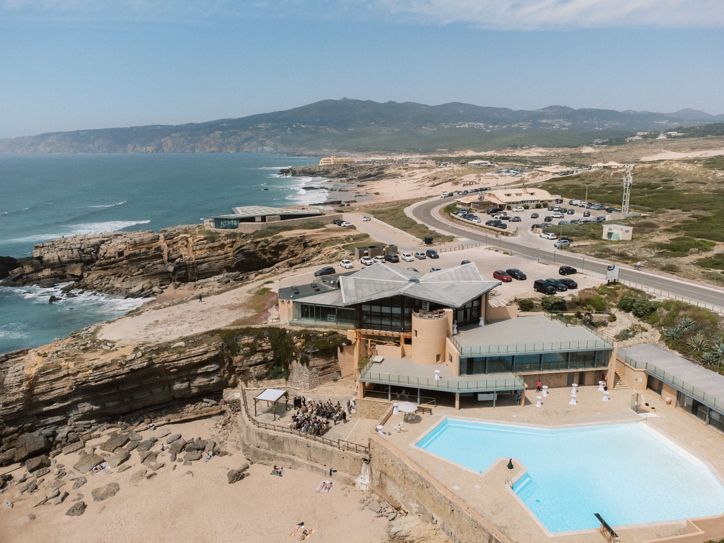 Aerial view of Arriba by the Sea wedding venue on the cliffs of Cascais overlooking the Atlantic Ocean.