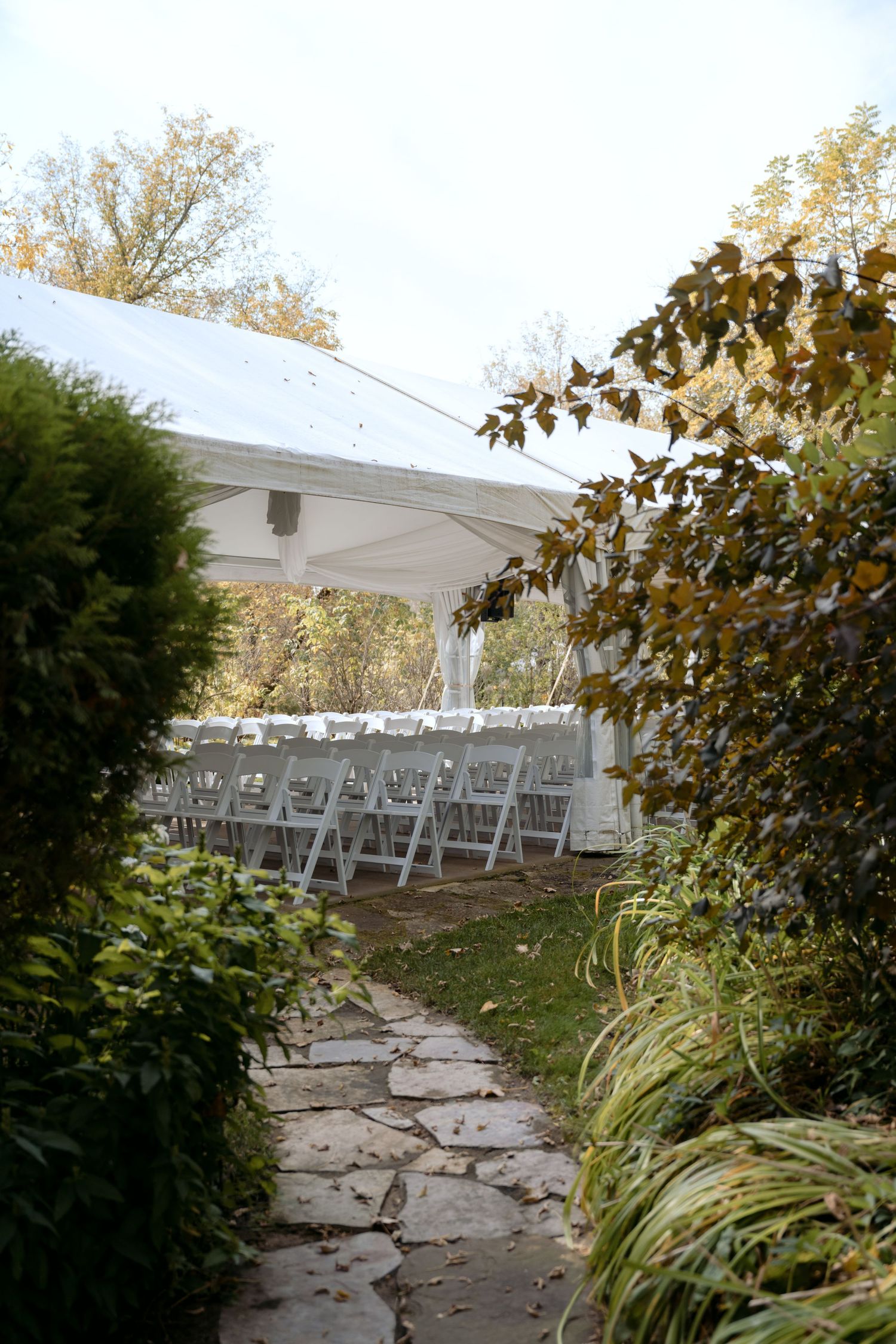 A private side entrance to the garden tent ceremony space at Trellis Weddings in Stillwater, MN.