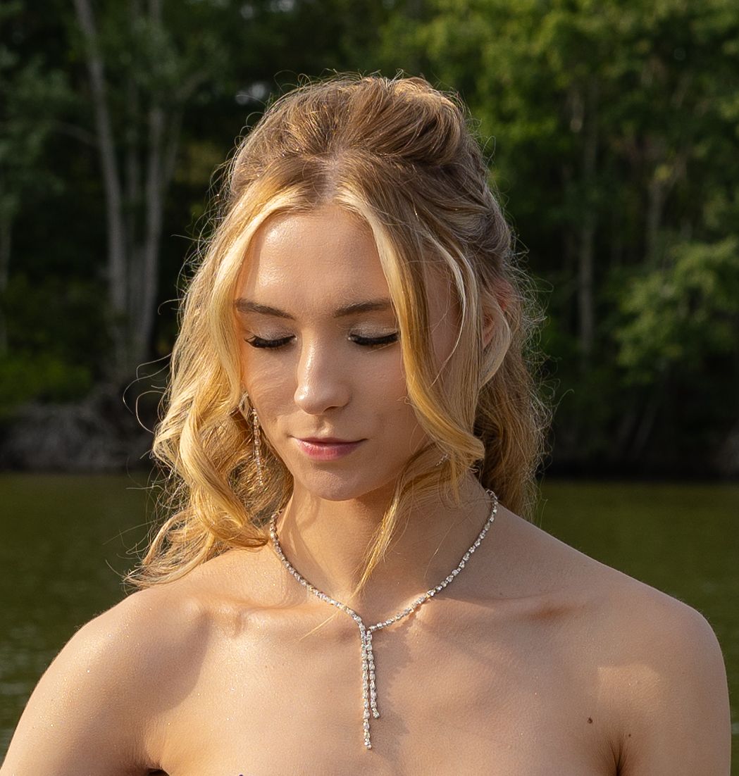 Close-up portrait shots highlighting elegant necklace and makeup.