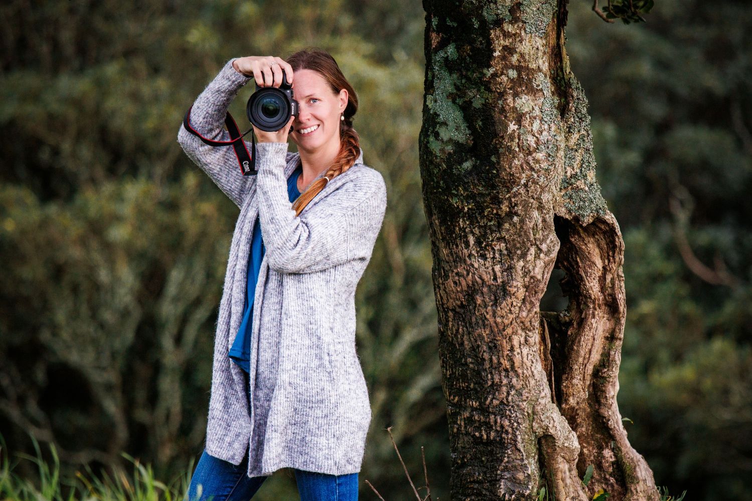 That's me, your photographer, holding my camera ready to capture your moments.