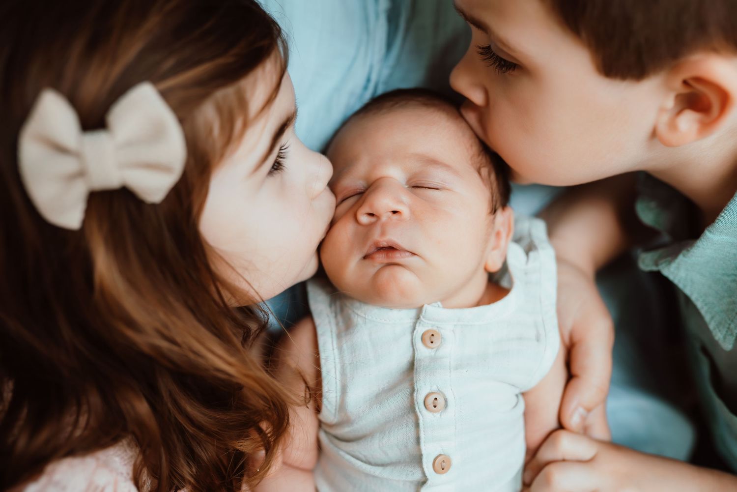 kissing baby, newborn, siblings, family photography, moncks corner,