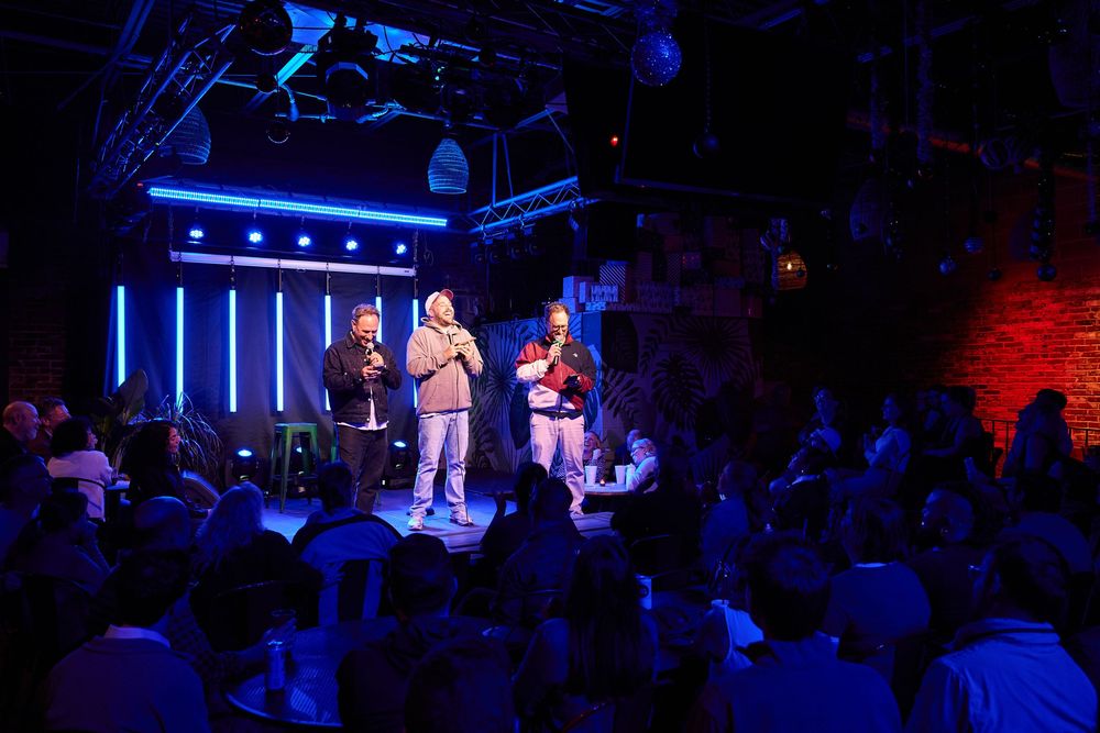 Comedians Daniel Van Kirk and Sklar Brothers on stage for Flyover Comedy Fest