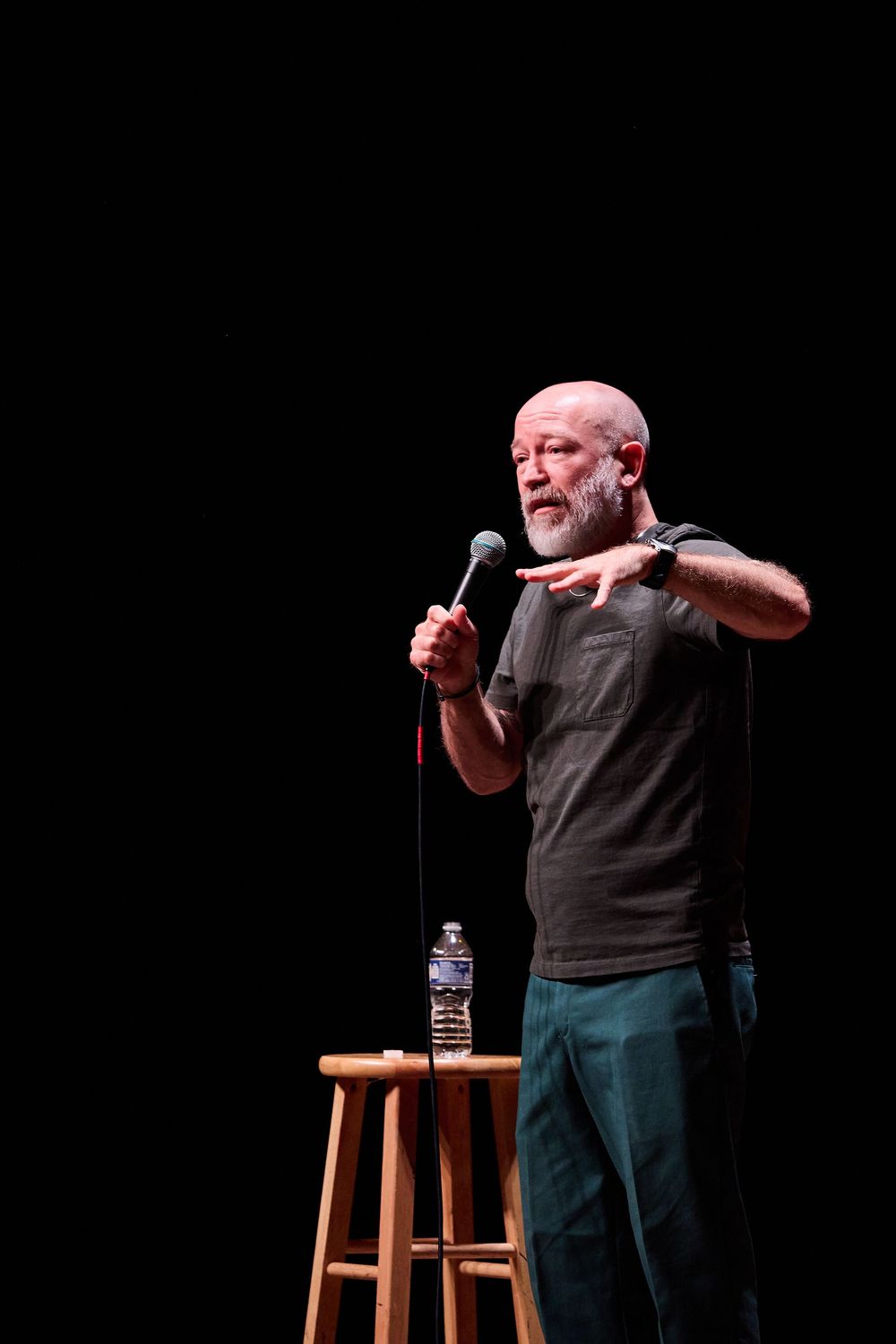 Comedian Kyle Kinane on stage for Flyover Comedy Fest