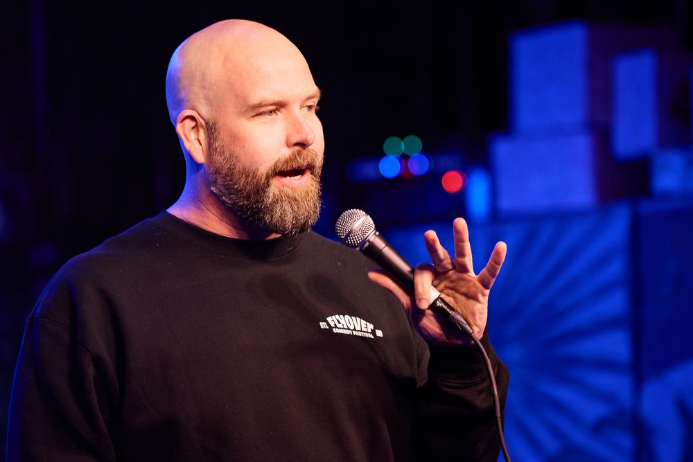 Comedian Daniel Van Kirk on stage for Flyover Comedy Fest
