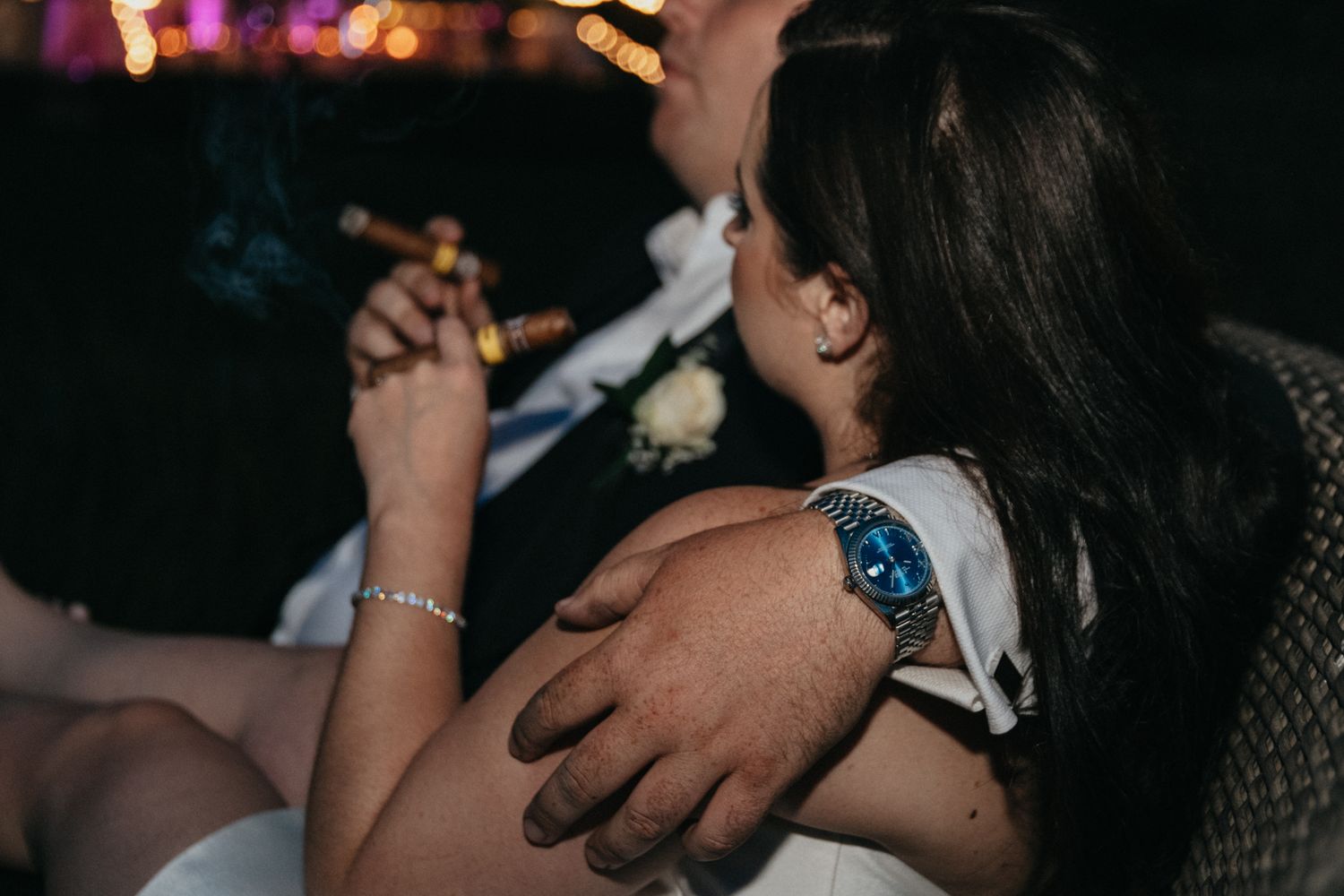 Wedding reception dance floor captured in dark ambient lighting.