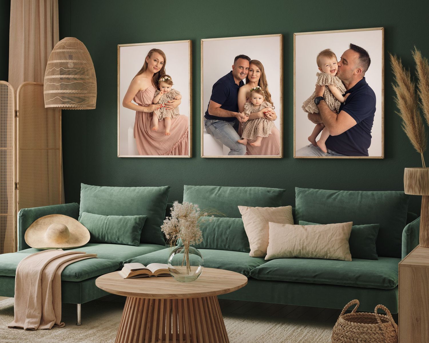 Modern living room interior with emerald green walls decorated with soft lighting and framed photos.