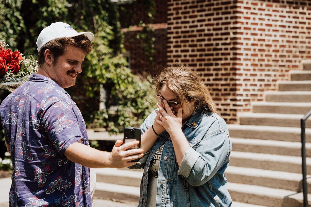 Emotional moment sharing the great news of engagement proposal over facetime at Gettysburg College PA