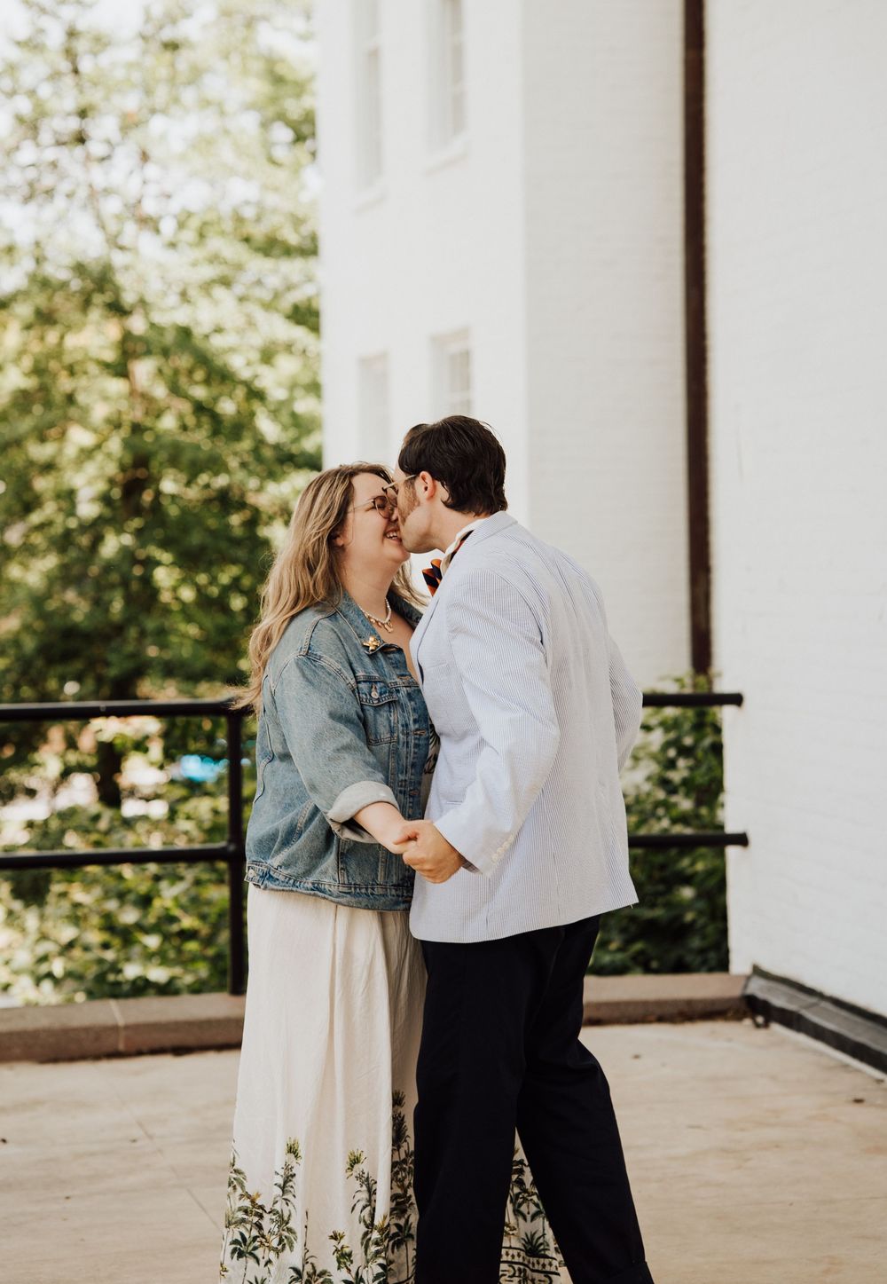 A romantic couple kissing for engagement photoshoot in Gettysburg College