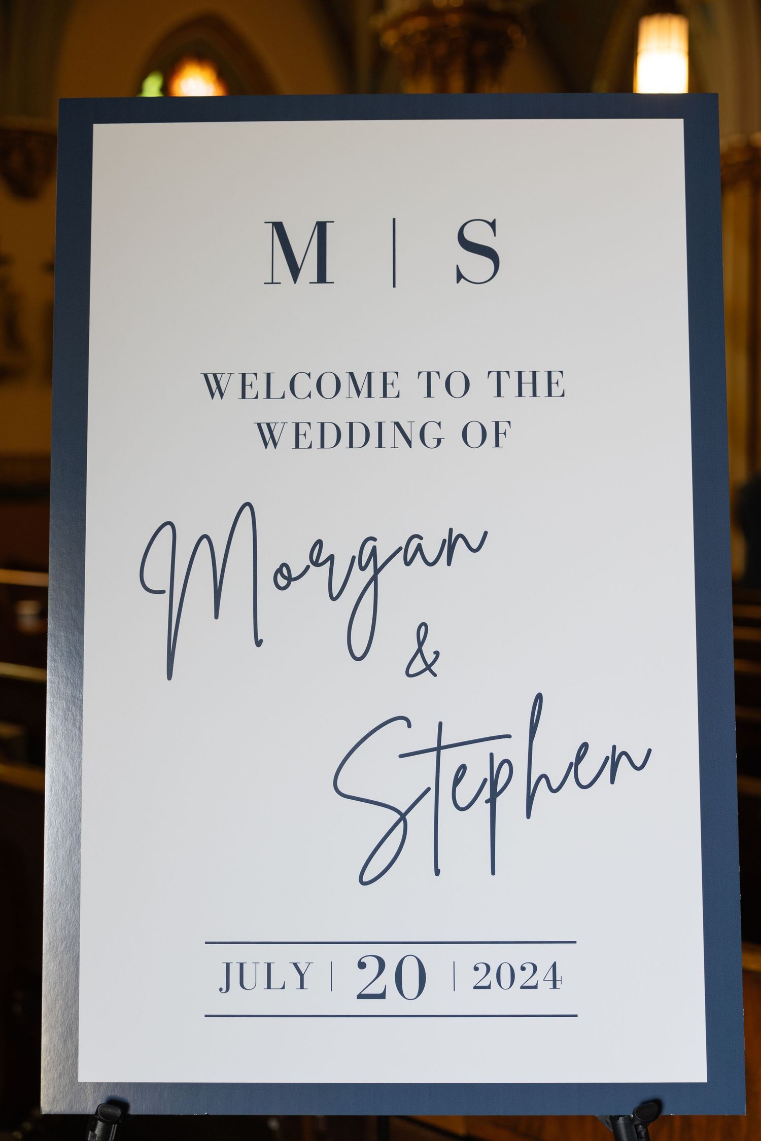 Four wedding reception signs in blue text display welcome messages and wedding details for MS wedding on July 20, 2021. Michigan Wedding
