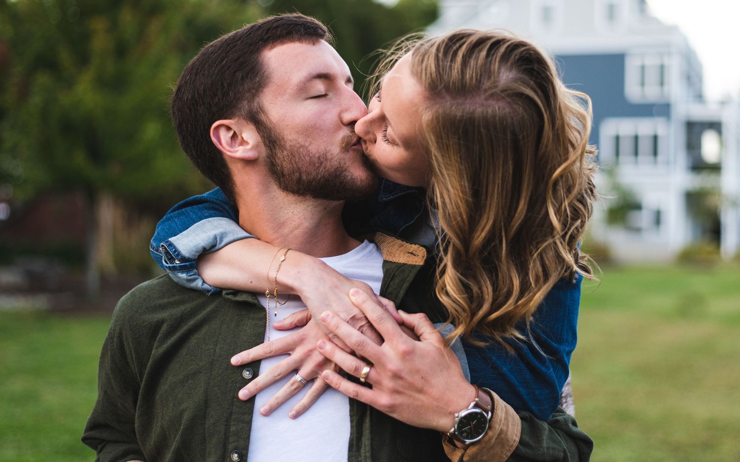 A couple kissing.