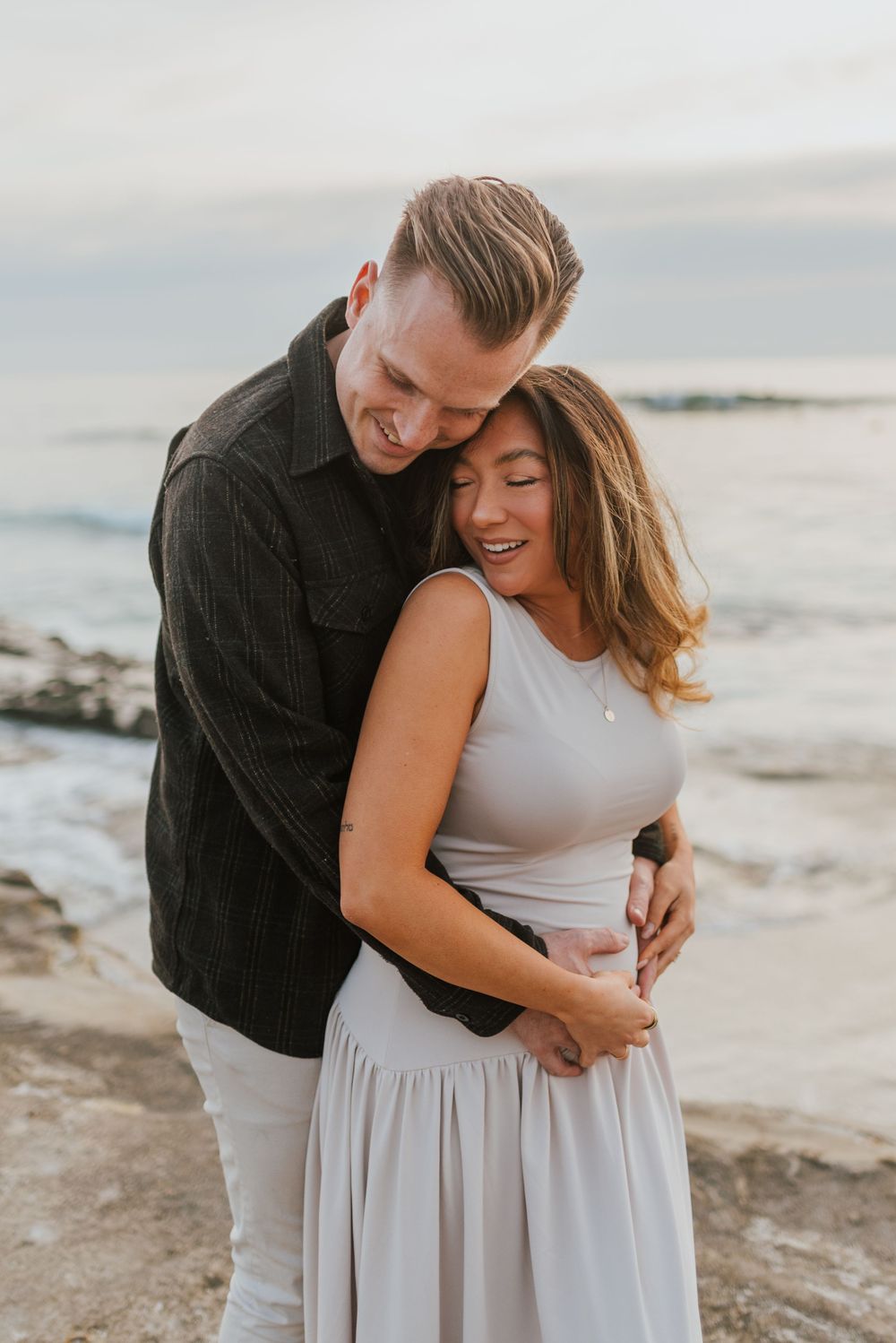 Windansea Beach maternity photos with soft light and natural posing, San Diego Couples Photography, Anna Romani Photography