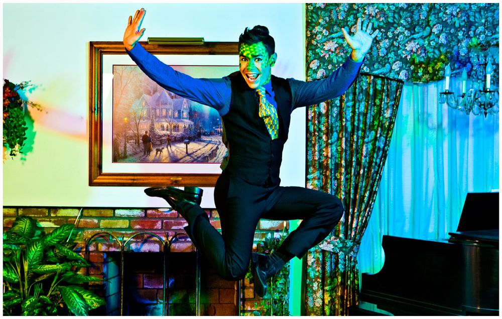 A collage of photos shows a performance on stage with dramatic lighting and theatrical poses.