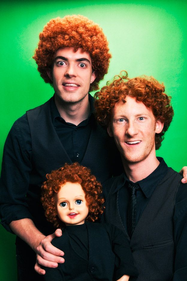 A playful photo sequence showing two people in black clothing with curly red hair against a bright green background.