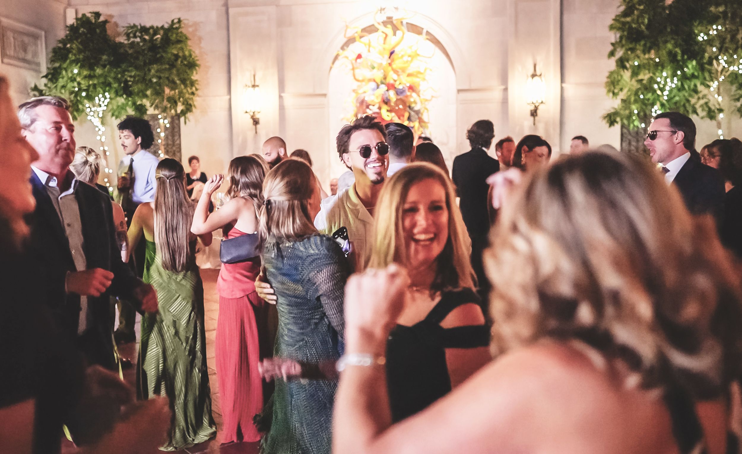 Wedding guests dancing in Columbus Museum Of Art