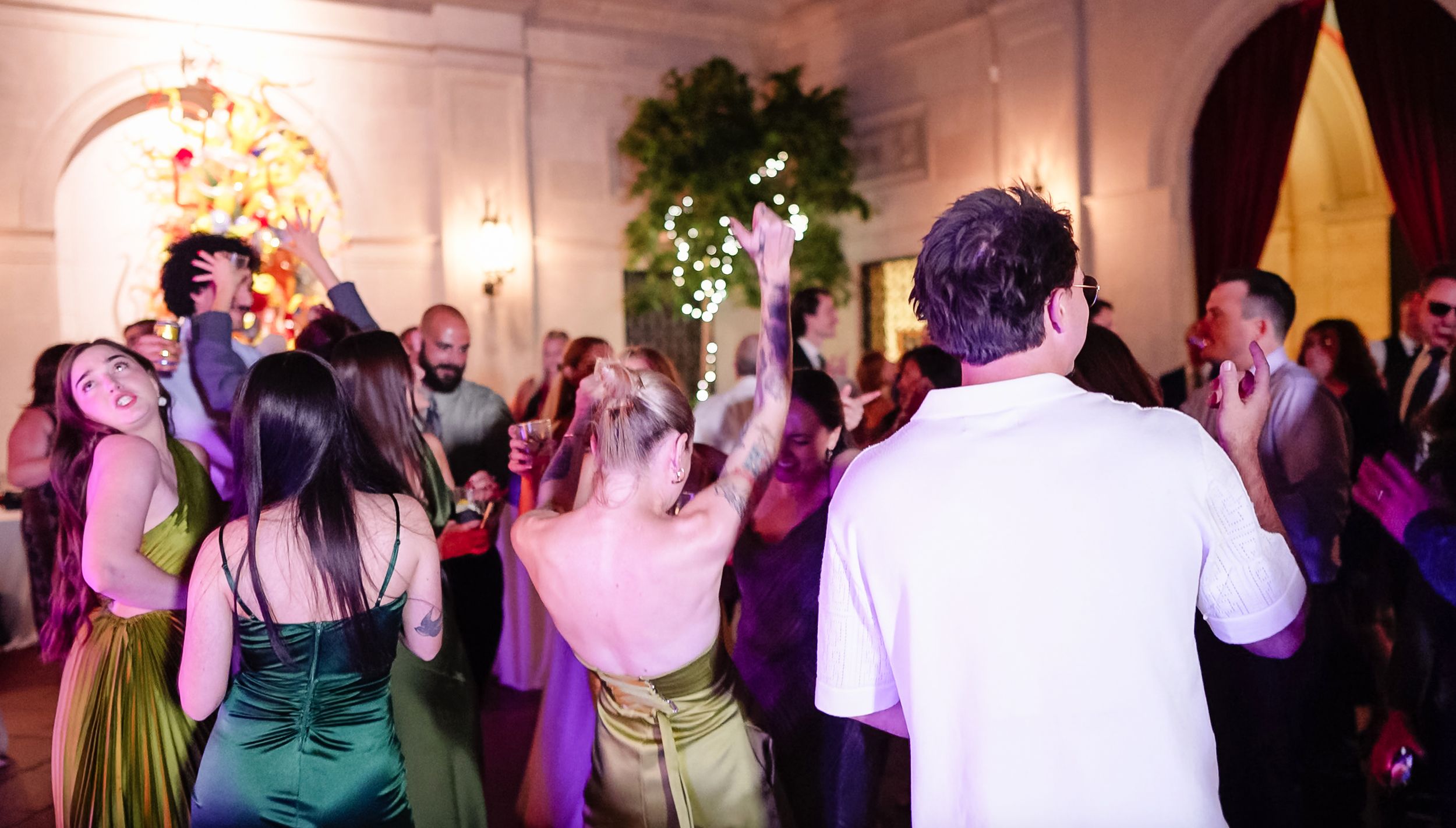 guests dancing and celebrating at an elegant indoor venue at Columbus Museum Of Art