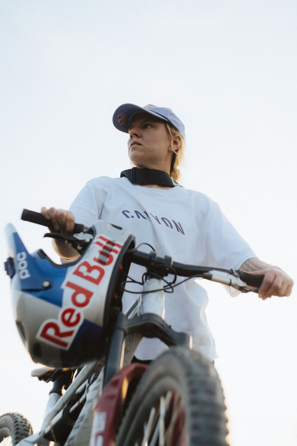 BMX bikes lined up against bright sky with Red Bull branding visible.