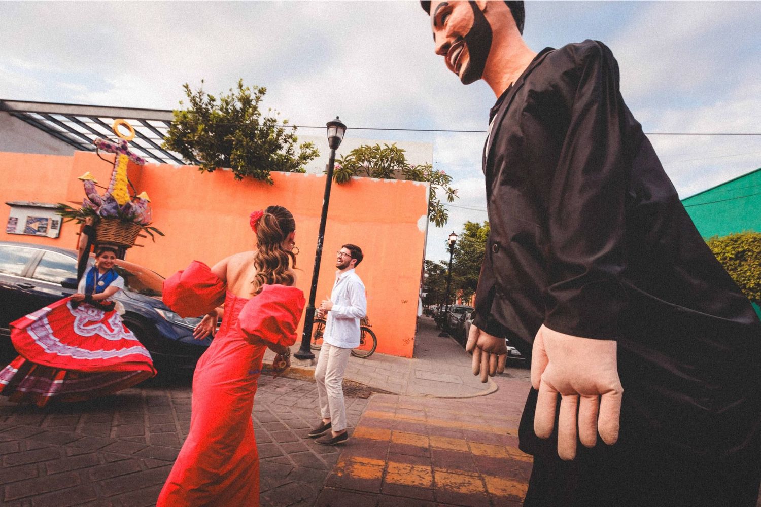 A series of connected images showing someone practicing parkour moves and flips on an outdoor urban surface.