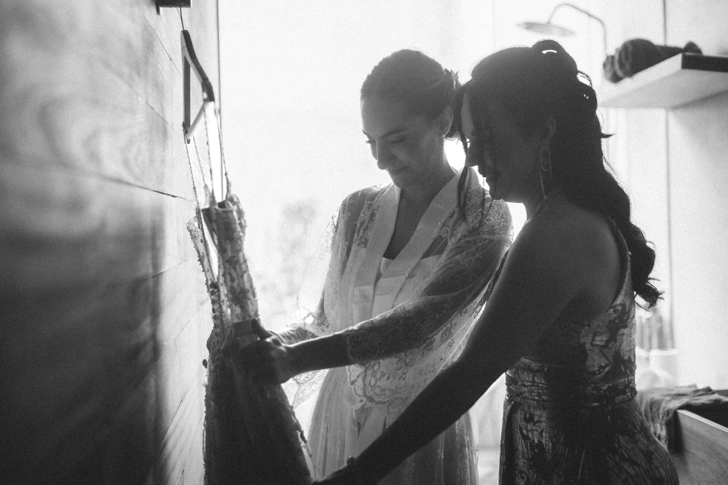 A series of black and white photographs showing silhouettes of people in a vintage indoor setting.