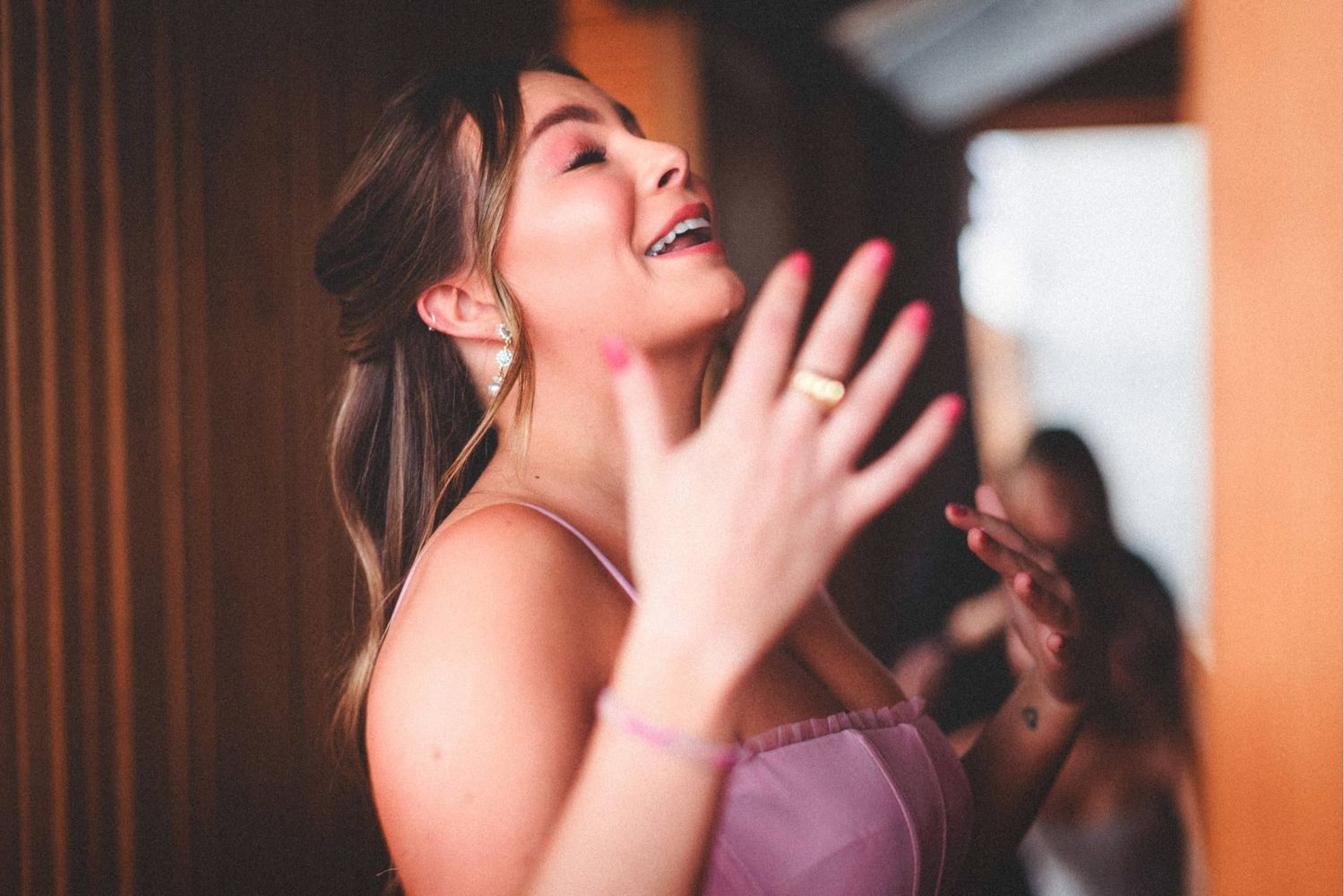 Series of warm-toned portraits showing emotional expressions in an indoor setting.