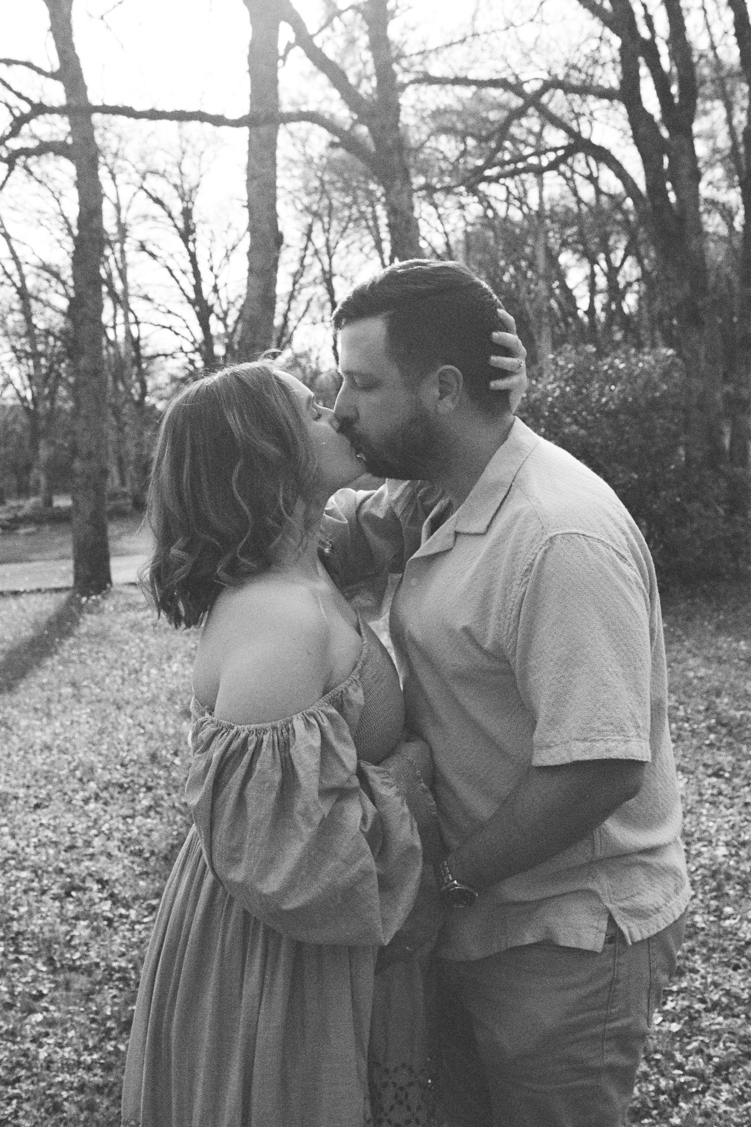 Intimate black and white portrait of a couple during their maternity session.