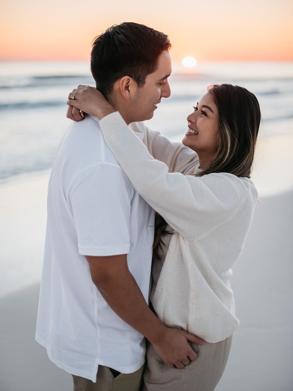 Couples sunset photos by MJ photograph. Best Miramar and Fort Walton Beach to visit. Professional photography services in Destin Florida.