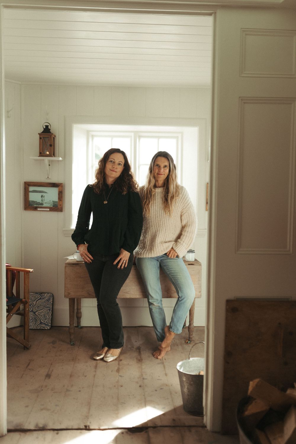 A sequence of candid indoor photos showing people in casual poses against white walls and wooden floors.