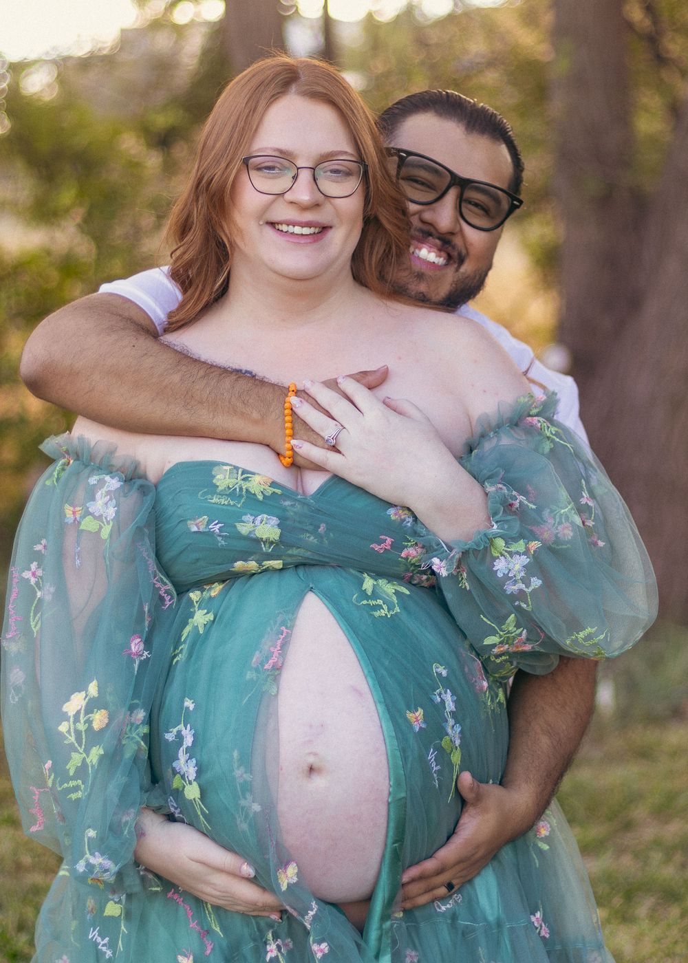 A series of maternity photos showing an expectant couple embracing in a garden setting at sunset.