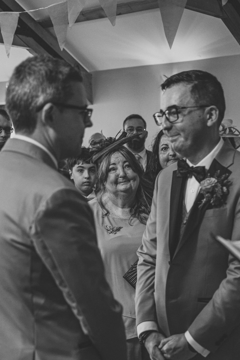 Mother having an emotional moment during her sons wedding ceremony Gellifawr Woodland Retreat