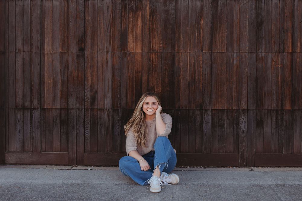 Senior photoshoot in Cullman, Alabama by a North Alabama Photographer. Downtown photoshoot. Field photoshoot in Cullman, Alabama