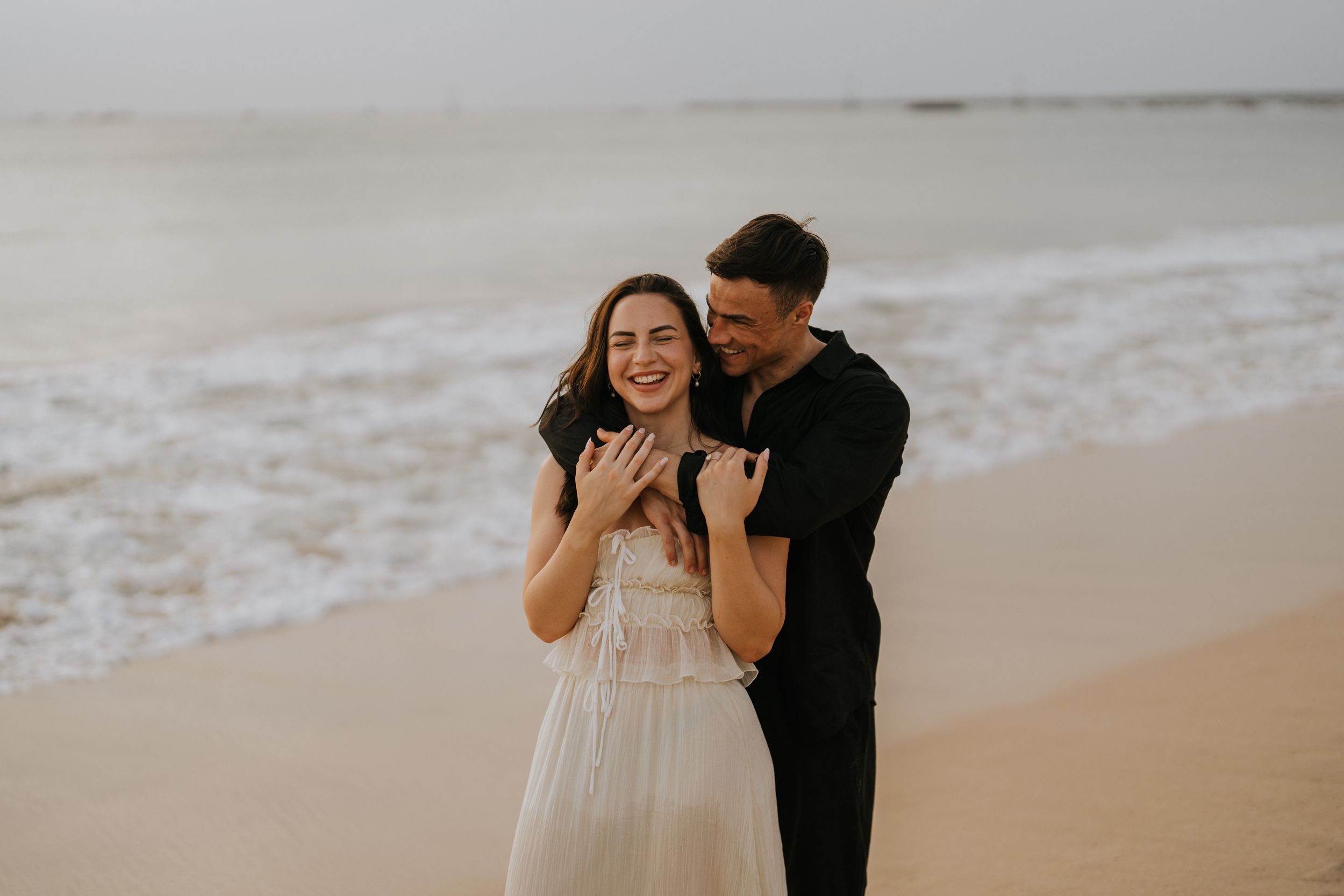 Professional romantic couple photography services at a Bali beach.