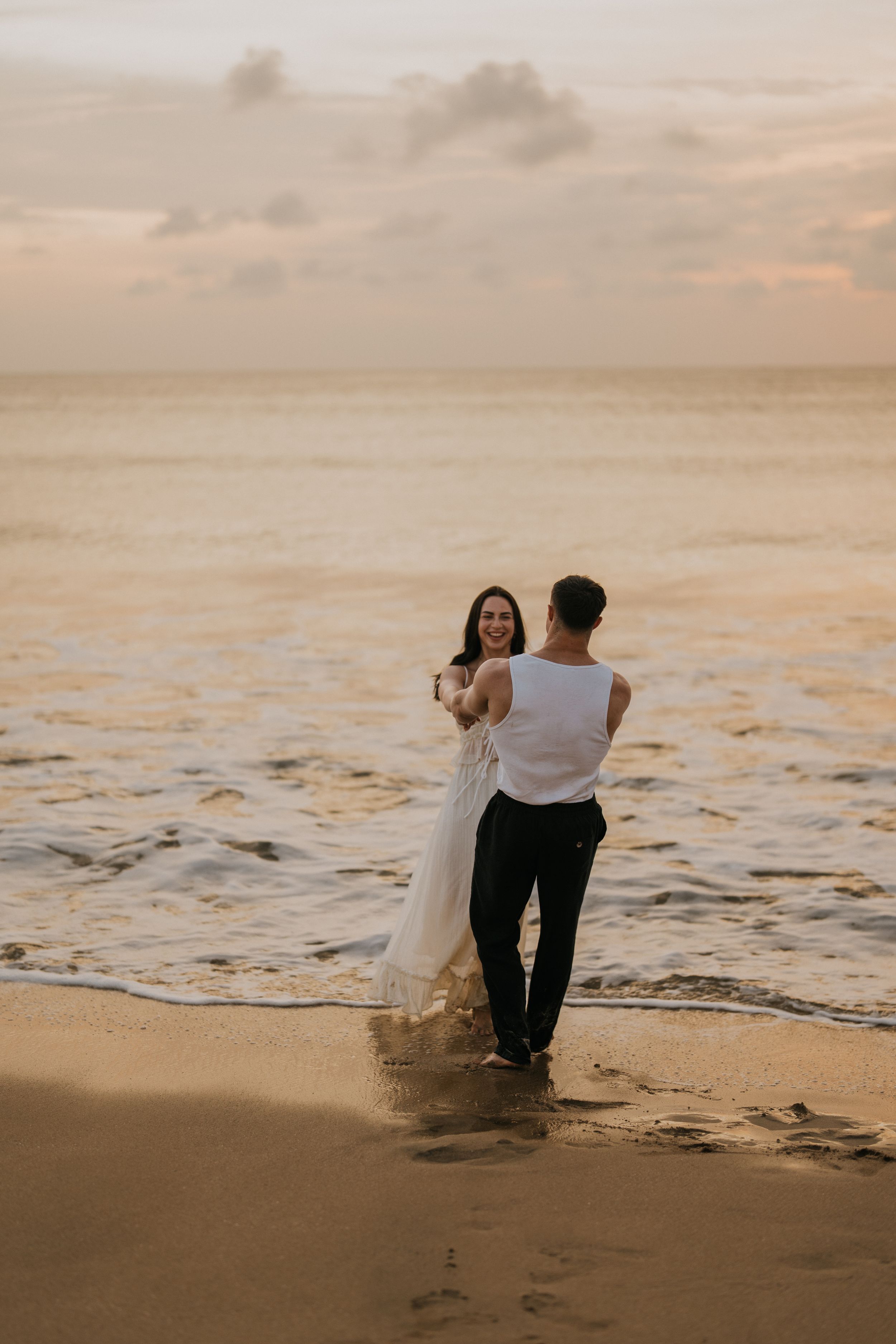 Professional romantic couple photography services at a Bali beach.