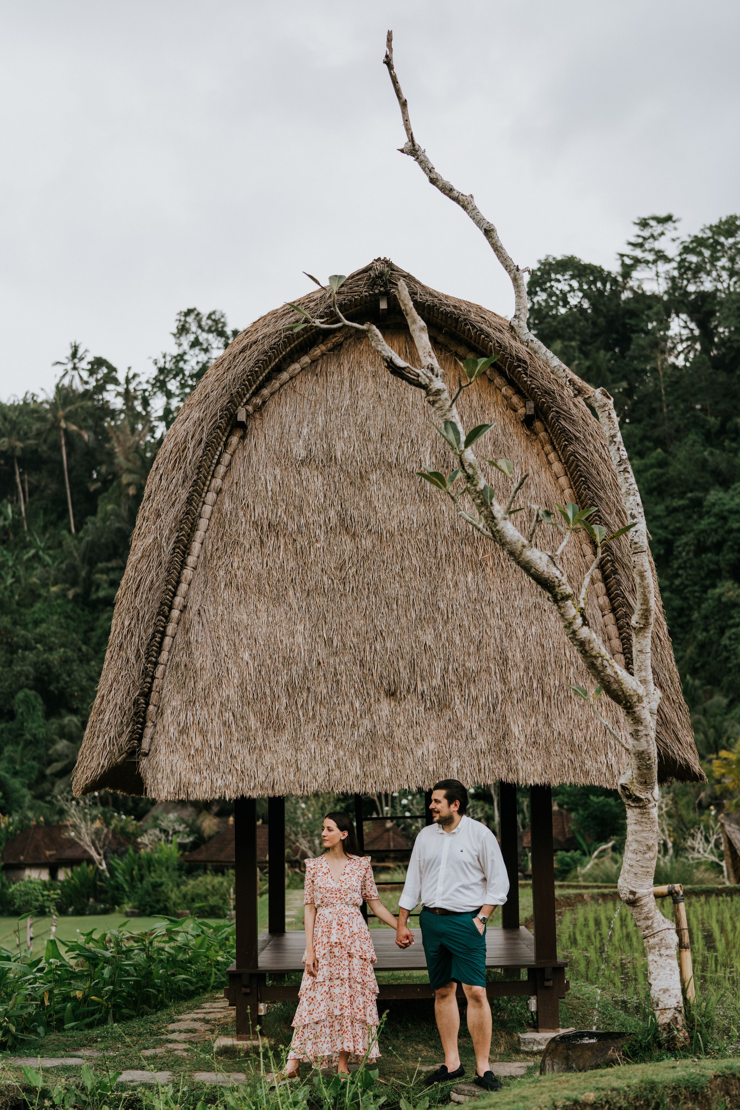 Romantic couple photoshoot services overlooking lush rice fields