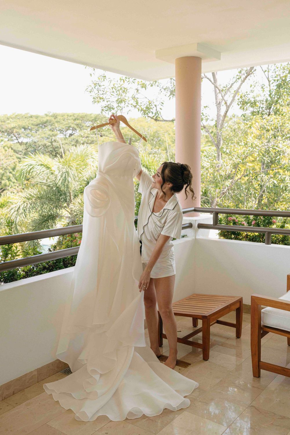 Bride getting ready in her dress before the Reserva Conchal wedding ceremony in Costa Rica.