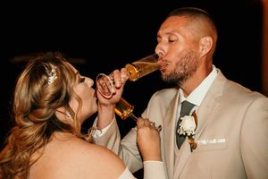 Romantic dance moments captured during an evening wedding reception with warm lighting.