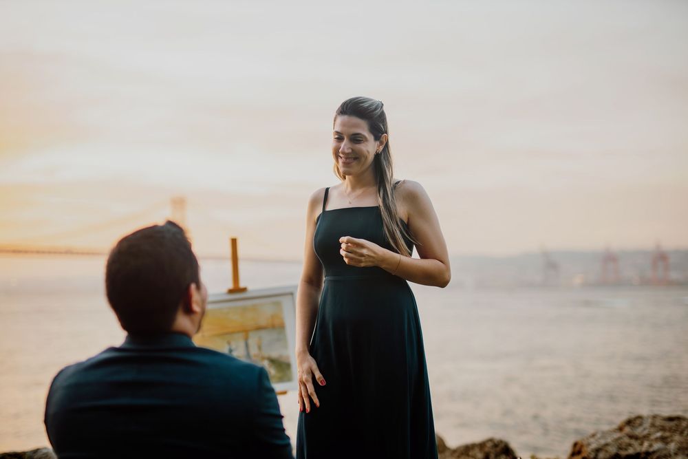 A series of beach engagement photos showing a couple in romantic poses during sunset by the ocean.