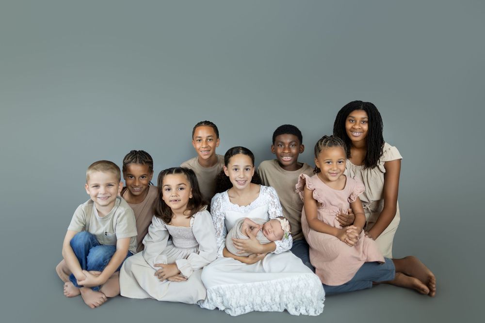 Collage of tender family moments showing parents and children in neutral tones against light backgrounds.