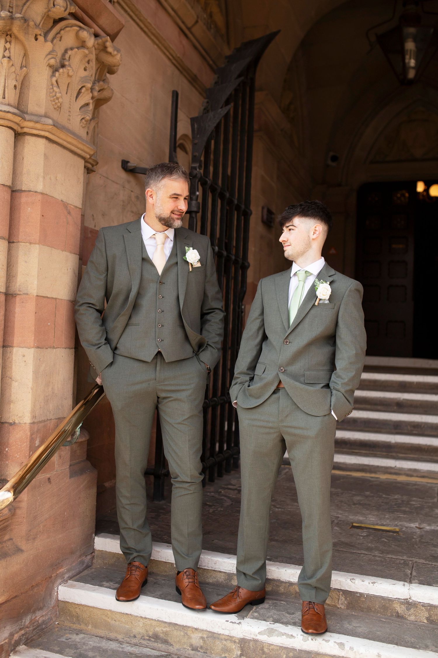 Groom and best man on steps of Chester Town Hall