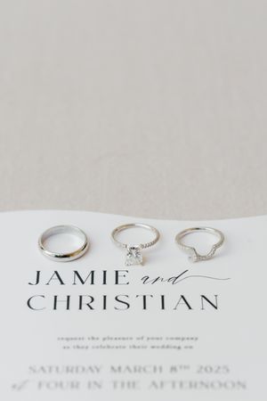 Elegant wedding invitation for Jamie and Christian showing the ceremony time at four in the afternoon.