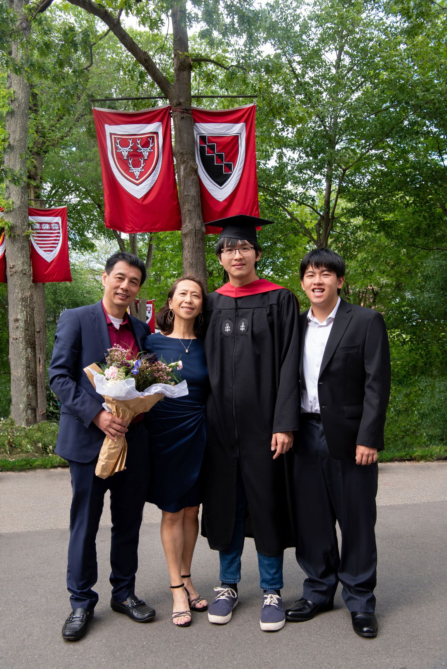 Family Graduation Portraits at Harvard University after Commencement on campus in Cambridge with Leah Ramuglia Photography.
